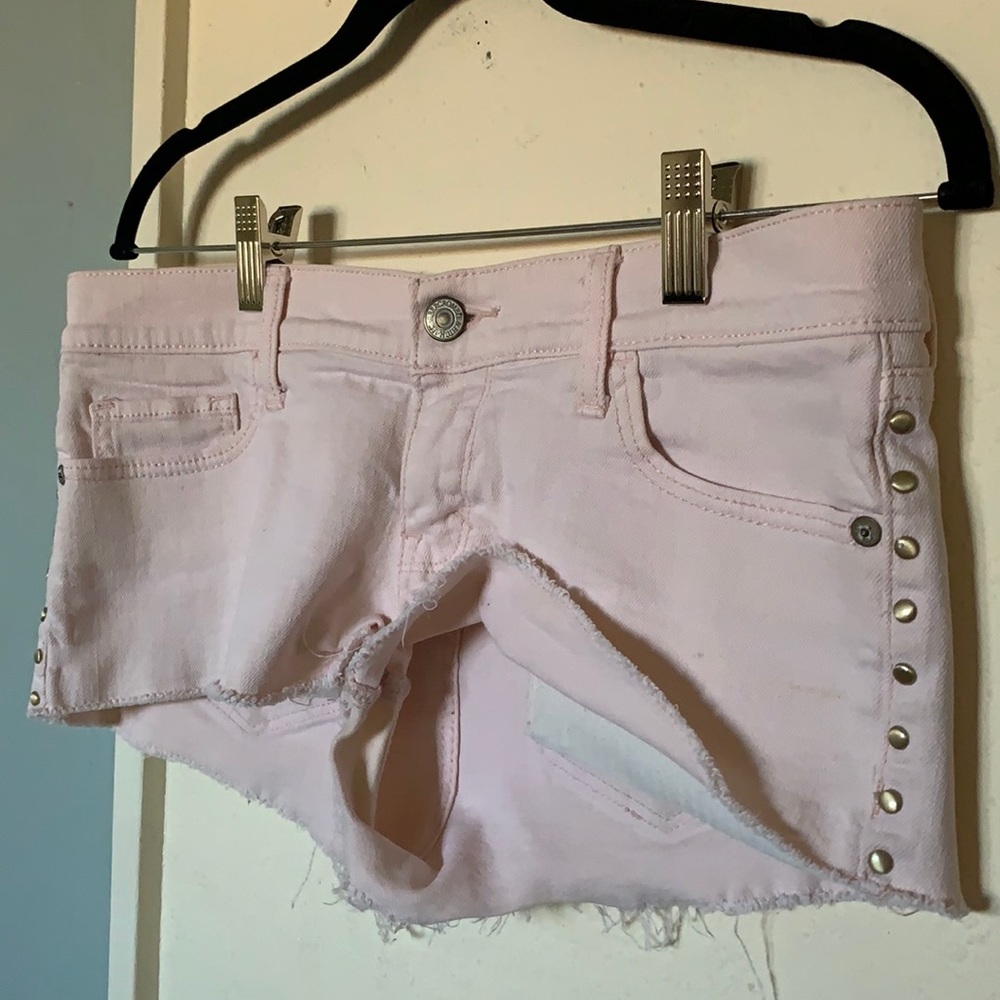 Pastel pink denim shorts